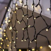 Светодиодная гирлянда уличная занавес бахрома (600x60 см/240 диодов/черный провод/тепло белые диоды) ― OnlineBazar.su